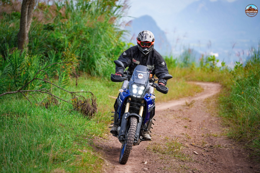 Big bike North Vietnam journey featuring smooth tarmac, sweeping curves, and scenic landscapes ideal for cinematic riding Vietnam.